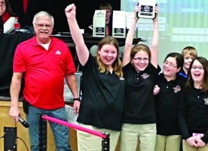 Vex Robotics Judge Larry Wood with North Union MIddle Schoolers celebrating a win! Robots Rock!