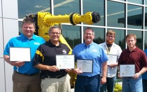 (l to r) Brad Pottkotter, Tad Douce, Ritch Ramey, Levi Retterer and Prof. Farson. These instructor earned the 60 hour FANUC certification. It is only awarded in a few places in the world, including RAMTEC. Mark Edington was the instructor.